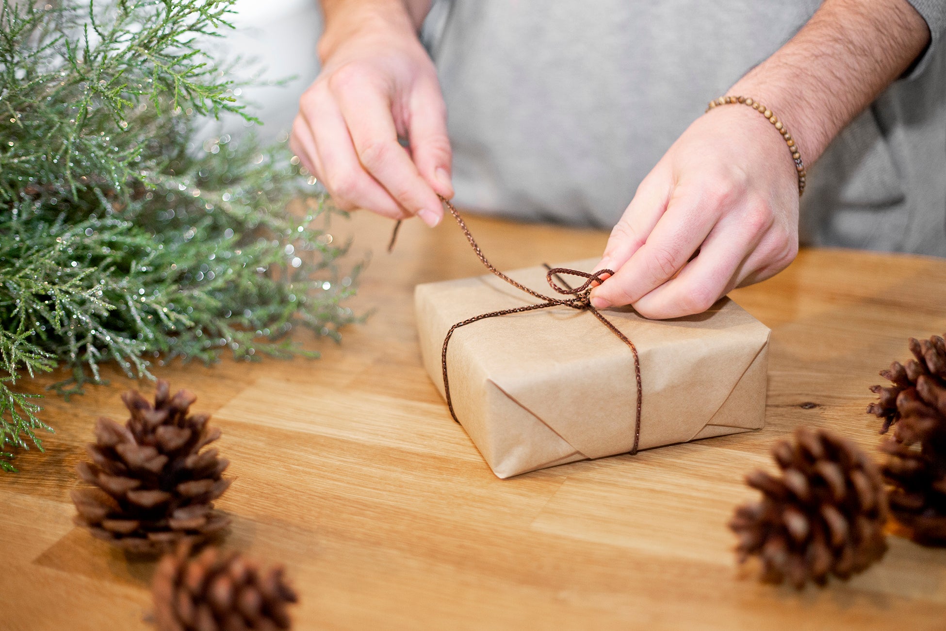 A christmas package being wrapped